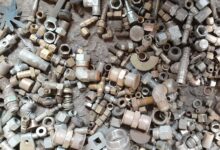 pile of gray and brown water pipes
