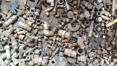pile of gray and brown water pipes